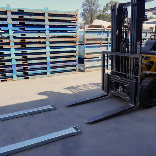 Forklift and fork extension
